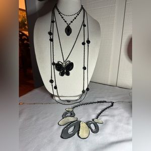 Group of 6 black tone necklaces